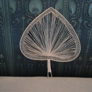 vintage wicker fan wall decor